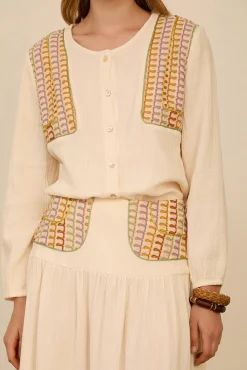 Blusa bimateria con pañuelo