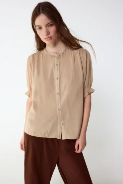 Blusa dobby fluido