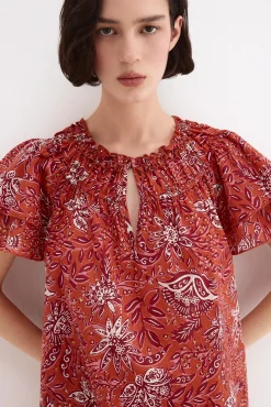Blusa estampada manga volante