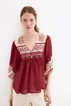 Blusa estampados combinados