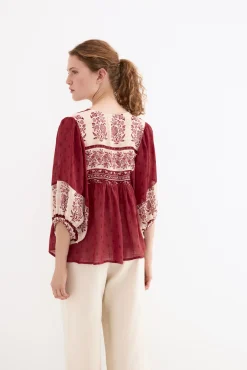 Blusa estampados combinados