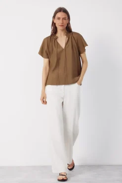Blusa manga raglán