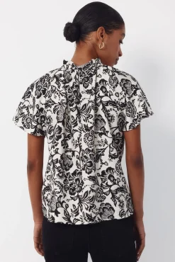 Blusa manga raglán