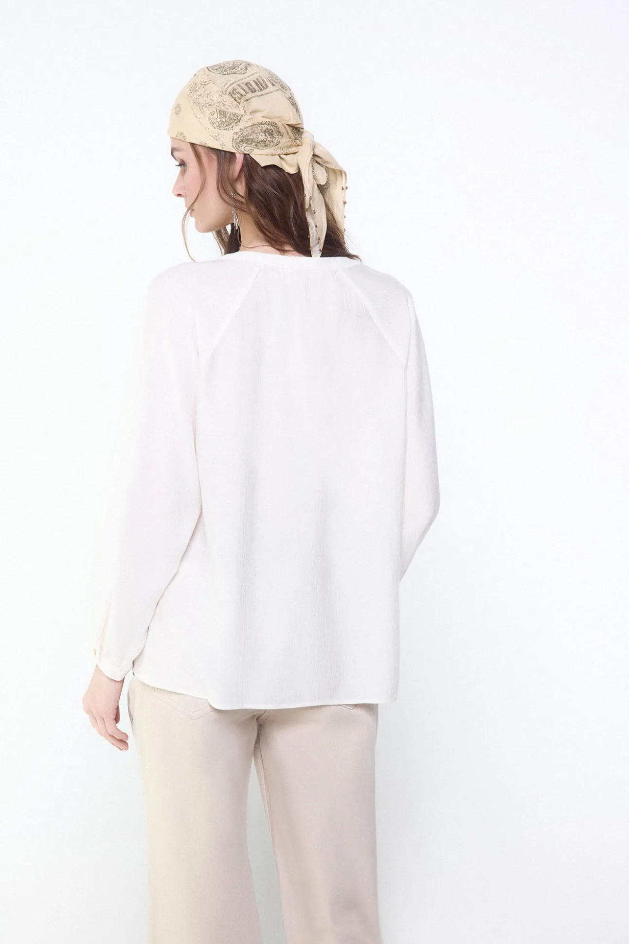 Blusa plisada fluida