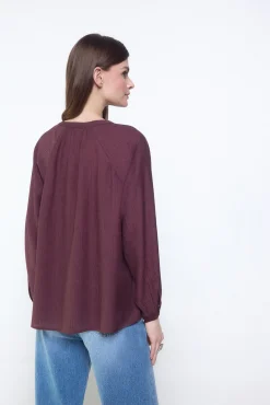 Blusa plisada fluida