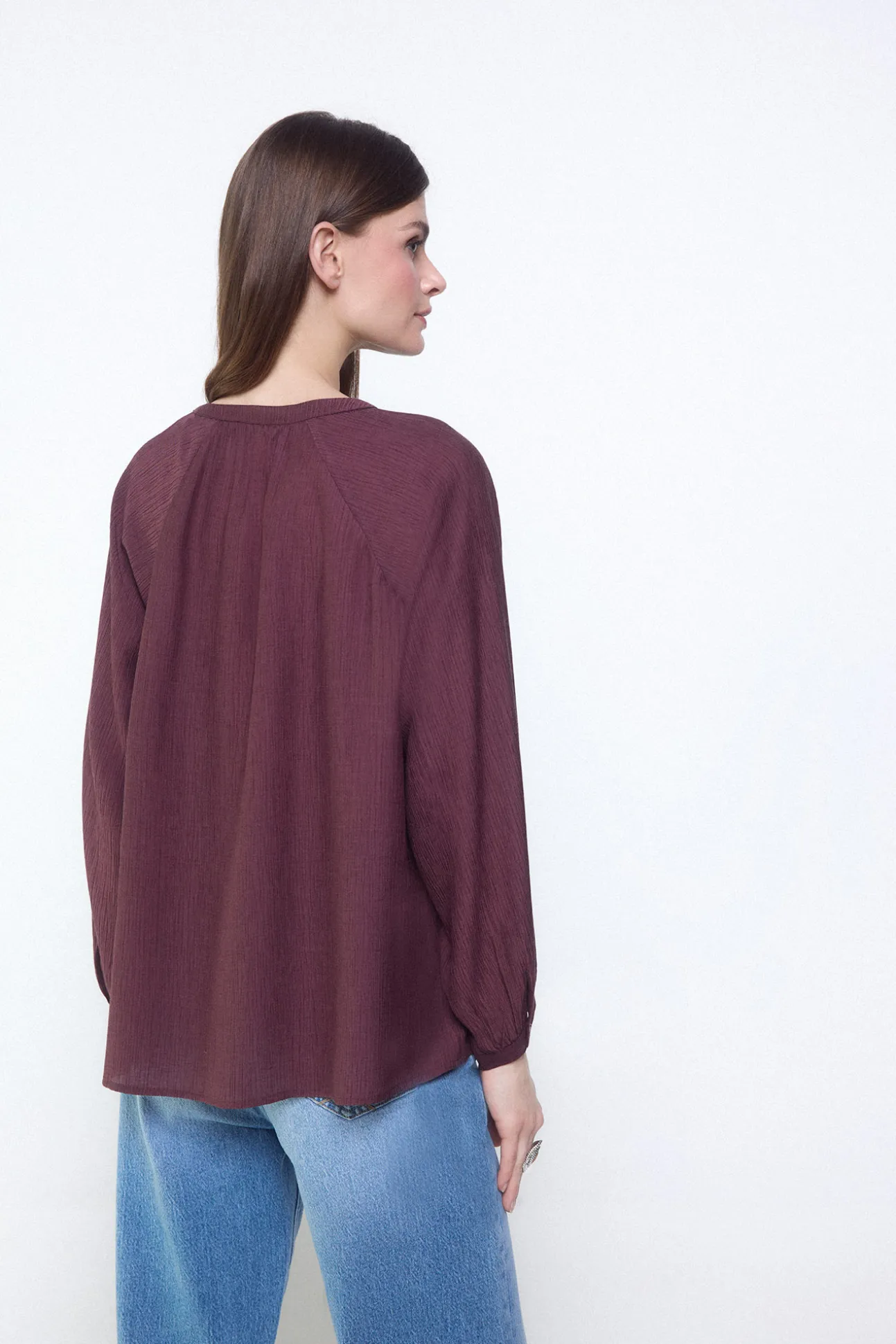 Blusa plisada fluida