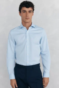 Camisa vestir lisa non iron + antimanchas