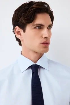 Camisa vestir lisa non iron + antimanchas puño gemelo