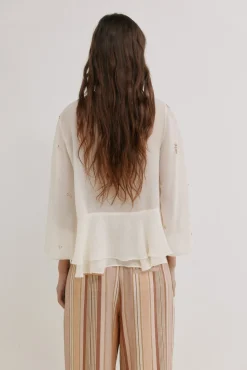 Cypria. Blusa fluída