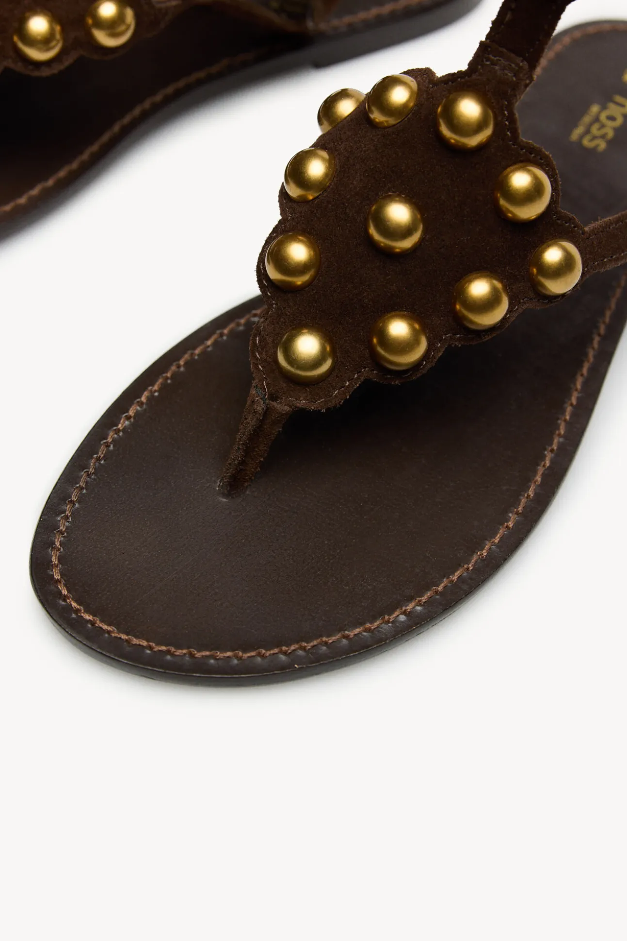Maisa. Sandalias piel piezas metálicas
