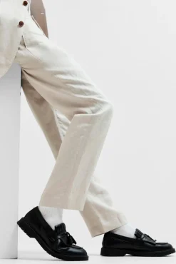 Pantalón de traje 100% lino.