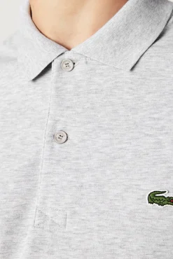 Polo con bordado de cocodrilo pespunteado