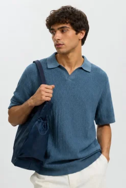 Polo de punto con cuello abierto