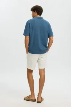 Polo de punto con cuello abierto