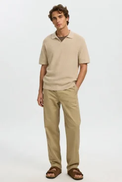 Polo de punto con cuello abierto