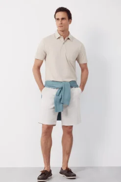 Polo rayas bolsillo