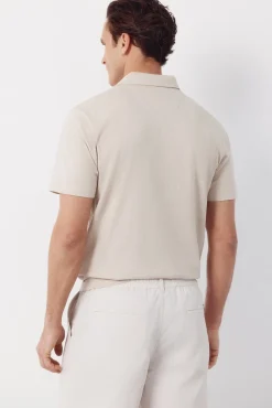 Polo rayas bolsillo