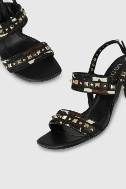 Sandalias en piel combinado efecto animal print