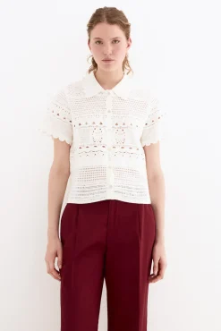 Top de punto efecto crochet cuello polo