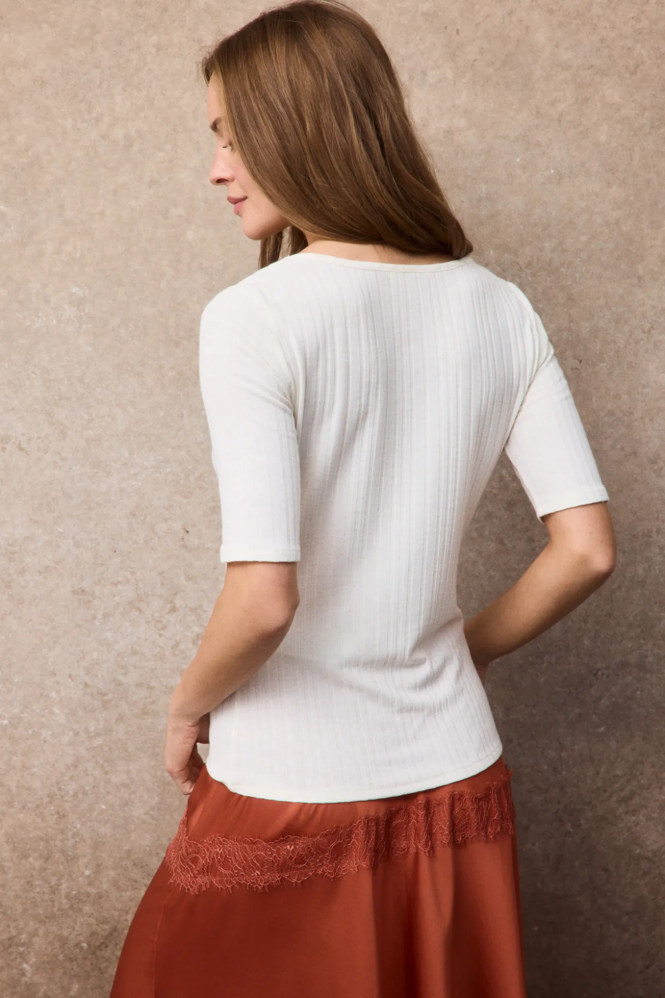 Top frunce escote pico